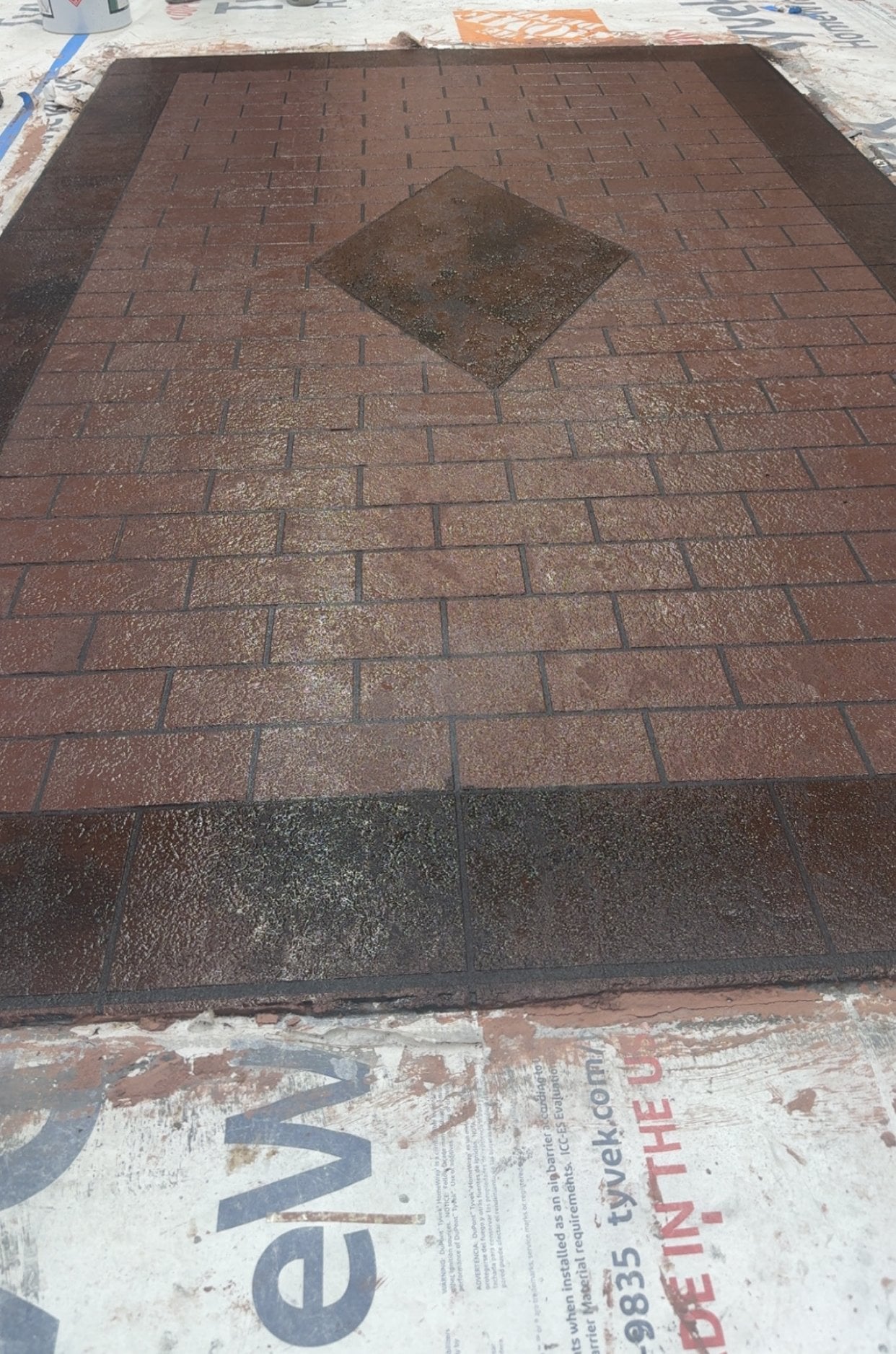 Brick pattern decorative overlay sample panel with a center diamond